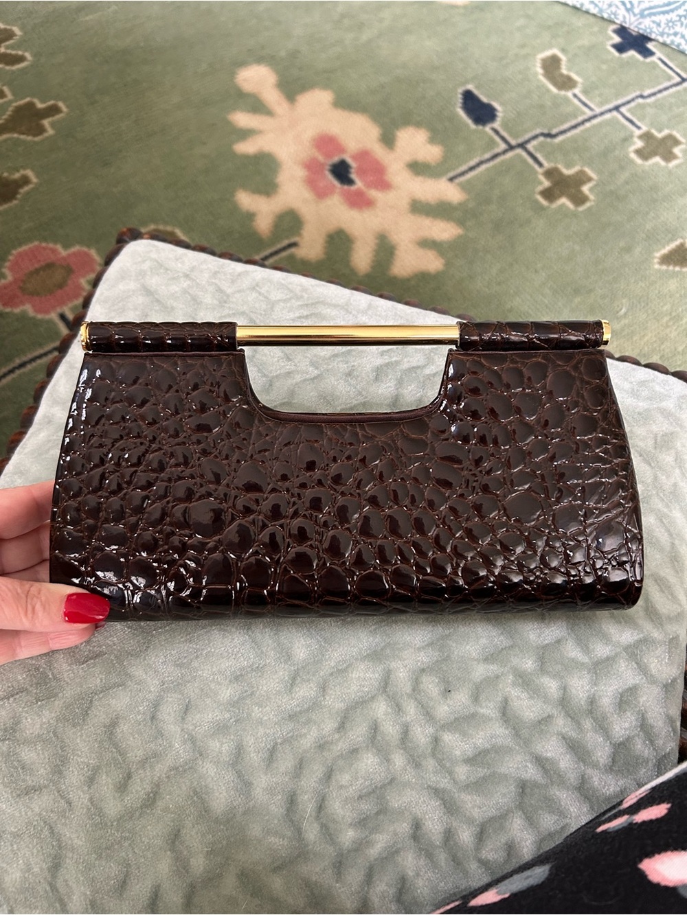 La Regale Dark Brown Croc-Embossed Patent Clutch with Gold Bar Handle